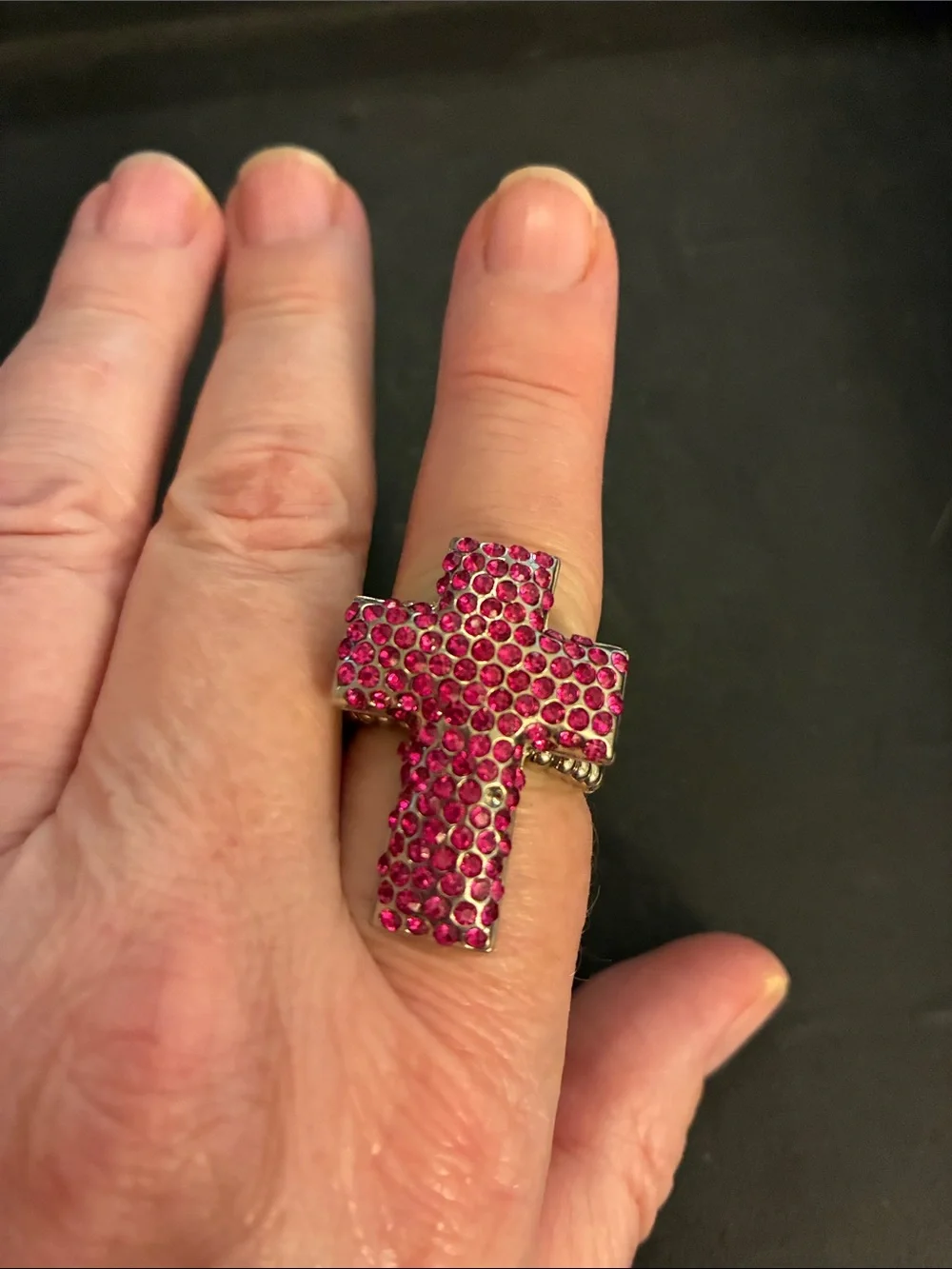 Pink Cross Statement Stretch Ring. Pink crystals encrust this cross ring. NWT